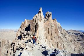 Mount Whitney is the highest mountain in the lower 48 United States, and hikers can ascend to its 14,494-foot (4,418-meter) peak.