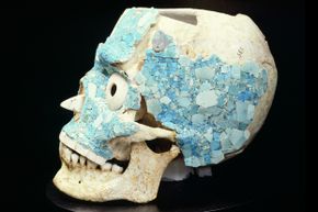 A skull decorated with turquoise salvaged from the treasury of Tomb 7 in Monte Alban, Mexico, now rests at the Museo De Las Culturas De Oaxaca. Caso was integral to discovering and excavating the tomb.