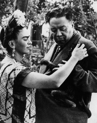 Diego Rivera and Frida Kahlo with their pet monkey