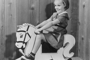 The rocking horse wasn’t all play — riding horses was a skill many kids would eventually have to learn. 