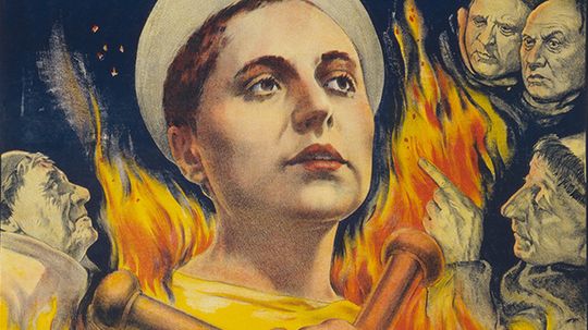 Why was cross-dressing the only crime Joan of Arc was charged with?