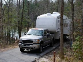 A truck towing a trailer.