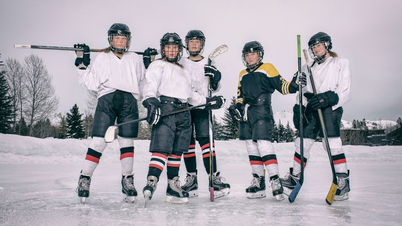 Members of the 1999-2000 New Jersey Devils team pose for a group