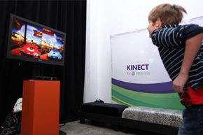 While the Microsoft Kinect offers three-dimensional game play movement, it doesn't project imagery out to the player's environment.