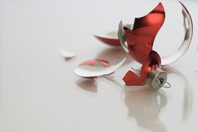 A broken ornament on a bare background