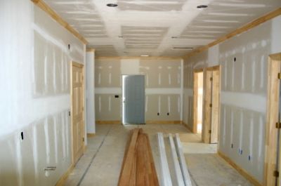 drywall and trimwork on the inside of an unfinished building