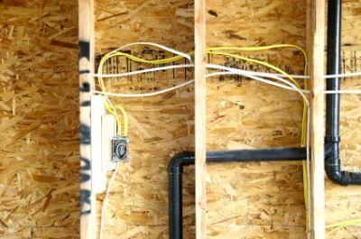 wires and pipes in a home under construction