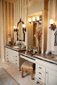 The romantic lighting compliments this luxurious bathroom.
