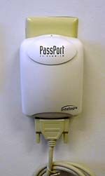 To install an Intelogis PassPort power-line network, you plug a wall device like this into an outlet.