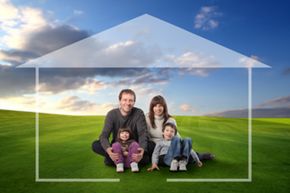 family sitting inside small home concept