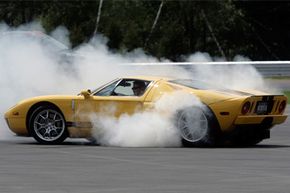 Ari Strauss maneuvers his Ford GT on a "skid pad" where drivers learn how to control a vehicle at Monticello Motor Club in Monticello, N.Y.