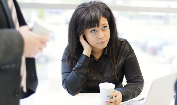 woman overhearing prejudiced comments