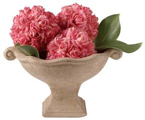 Place one type of flower into afavorite container for an informal arrangement.