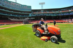 Jason Griffith mows the infield at Fenway Park in Boston, Mass.