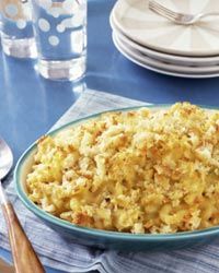 Macaroni and cheese, a classic cheesy dish, is a favorite among both kids and adults. See more pictures of comfort foods.