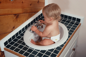 You can use the sink to clean dirty diapers if you want, but we suggest taking them off the baby first.