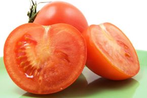 Before you blanch tomatoes, cut out their brown stem scars.