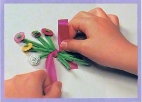 Gather stems and tie a ribbon.