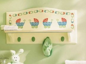 Stencil the Nursery Display Shelf.