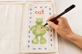 Stencil a heart on each animal with a 1/4-inch brush.