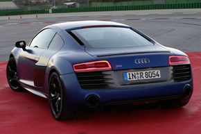 The mid-engine, all-wheel-drive, 2014 Audi R8 V-10 plus -- a supercar that simply begs to be driven fast.