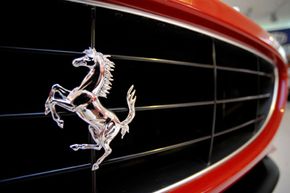 The Ferrari prancing horse logo is seen of the radiator of a California model on display at the Ferrari factory in Fiorano, near Modena, Italy.