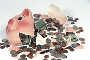 When it comes down to breaking open the piggy bank, it's time to figure out just how much it takes to live on. See more banking pictures.