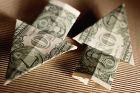 You don’t need fancy paper to make origami. Even a simple dollar bill will do. 
