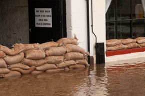 Sandbags protecting a business from floodwaters in England.