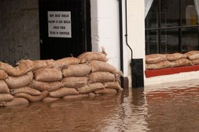 Why do people use sandbags before a flood