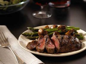 Dinner plate with steak on it