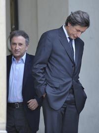 TV producer Michel Drucker (left) and President of the France Télévisions Group, Patrick de Carolis after a report on Internet taxation.