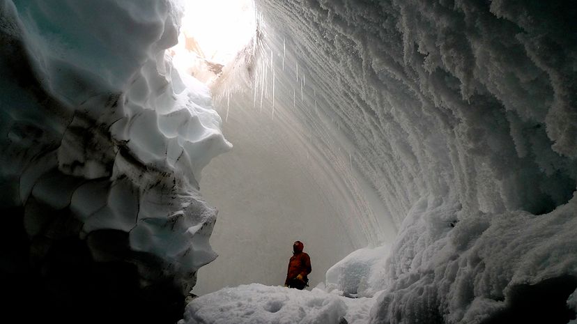Subglacial geothermal caves in Antarctica can get pretty warm, thanks to the sunlight shining through thin ice. Chadden Hunter/Nature Picture Library/Getty Images