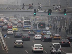 Constant stop-and-go traffic, like the kind seen hear in Beijing, China, adds significantly to air pollution. Can idle-stop systems reduce fuel consumption?