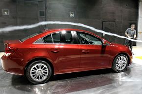 A 2011 Chevrolet Cruze ECO is tested in the world's largest automotive wind tunnel during a commemoration of the 30th anniversary of the General Motors Aerodynamics Laboratory in Warren, Mich.