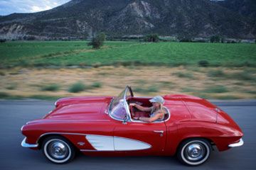 woman cruising in convertible