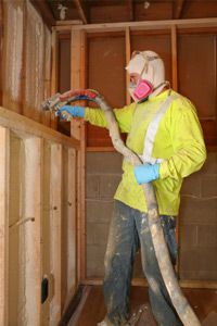 Spraying insulation on home remodel/addition job.