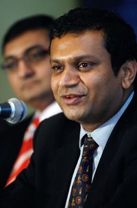 Morgan Stanley India Vice President Jayesh Gandhi (L) looks on as Country Head Narayan Ramachandran (R) speaks during a press conference to announce the launch of their new mutual fund in Mumbai, on February 7, 2008.