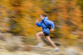 Action blur of woman running