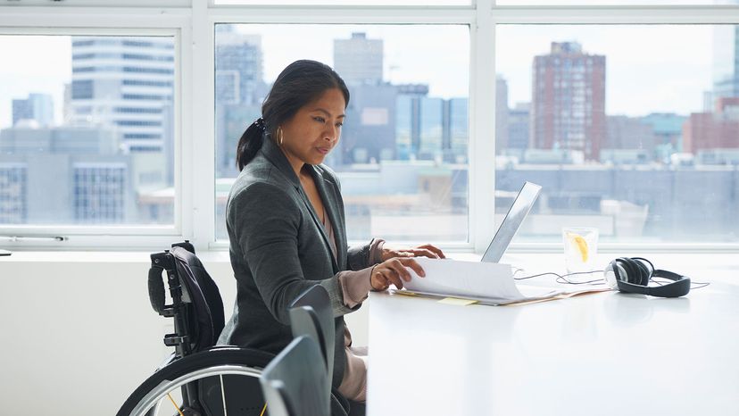 woman in wheelchair at computer