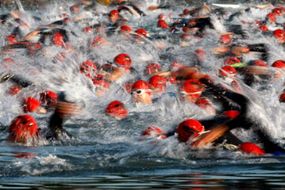 Trithletes take off at the start of the 2009 Ironman European Championship in Frankfurt am Main, Germany.