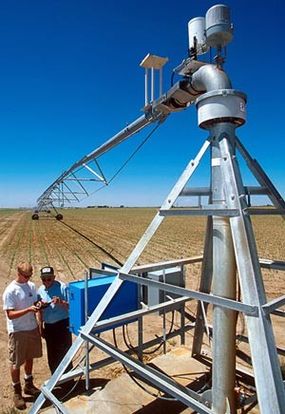 Ryan Younkin and Dale Heermann download data about the movement of a center-pivot irrigation system to find out the amount of water and time it took to irrigate an area.