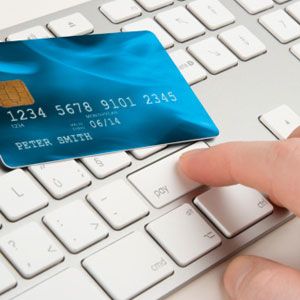 credit card and laptop computer
