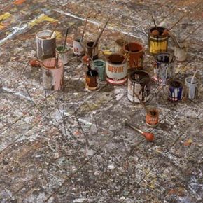 A view of the paint-splattered floor of an art studio used by artist Jackson Pollock.