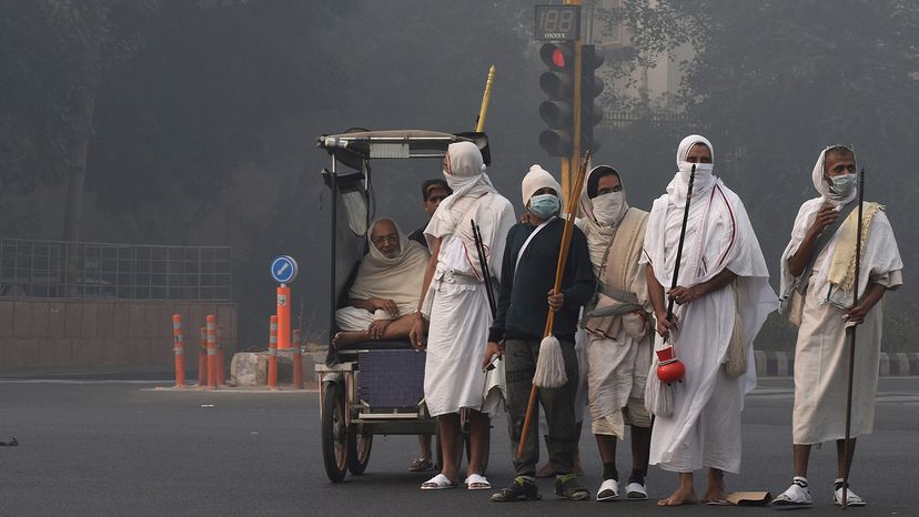 Jain monks crossing road in India