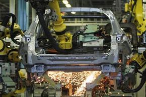 Robots assemble parts at Nissan's Tochigi plant in Kaminokawa, Japan. The plant produces models such as the Infiniti and the GT-R supercar as well the latest Fuga.