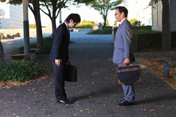 Japanese businessmen bowing