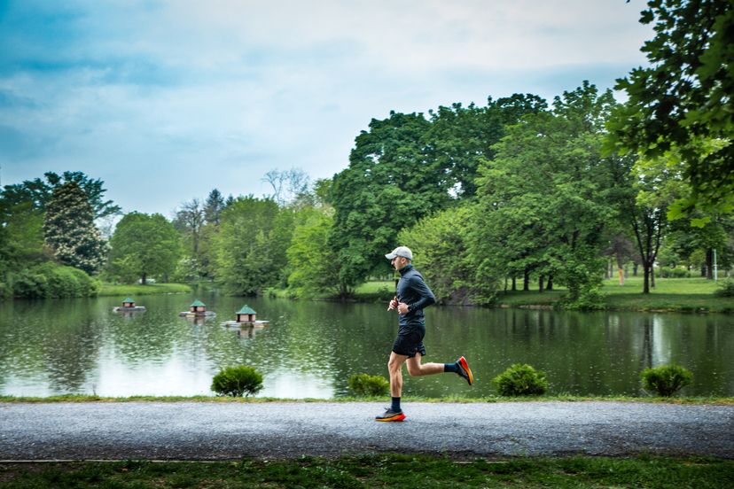 Man jogging on rainy day