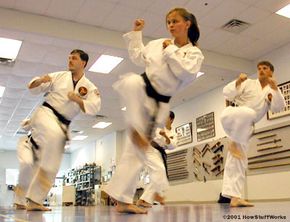Karatekas practicing at Karate International of Raleigh. While the instructors at this school don't teach Zen Buddhism, they do help their students achieve inner focus and enlightenment. The spiritual elements of karate complement most major religions.