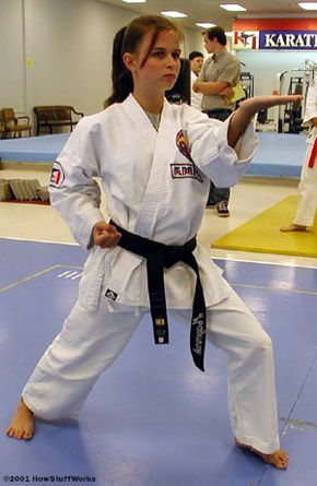 Mindy Mayernik, a third-degree black belt karateka at Karate International of Raleigh, assumes a defensive stance.